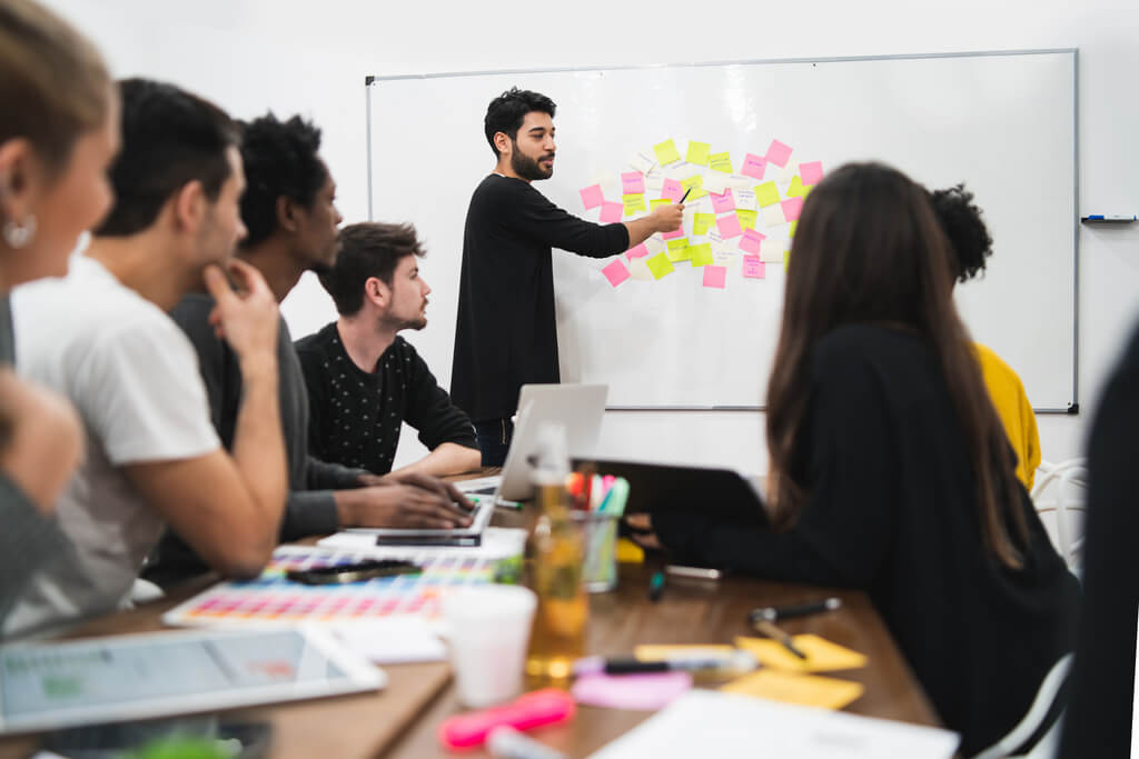 digital marketing manager leading a meeting